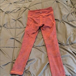 Lululemon Invigorate high rise orange crackle burst Patterned Leggings